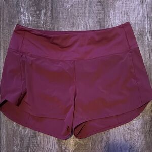 Lululemon Athletica Purple Athletic Shorts with Curved Hem